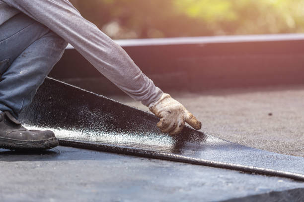 Professional Basement Waterproofing technician working in Nunica, MI
